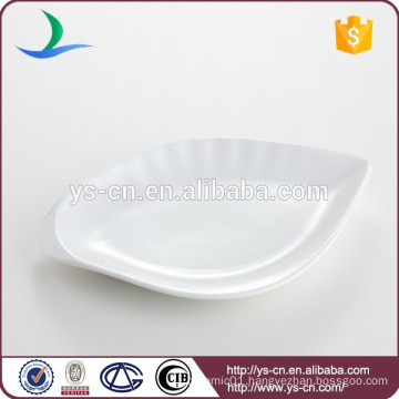Eye-shaped white restaurant hot plate of ceramic